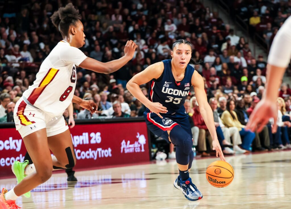 Feb 16, 2025; Columbia, South Carolina, USA; UConn Huskies guard Azzi Fudd (35) drives against the South Carolina Gamecocks in the second half at Colonial Life Arena. Mandatory Credit: Jeff Blake-Imagn Images