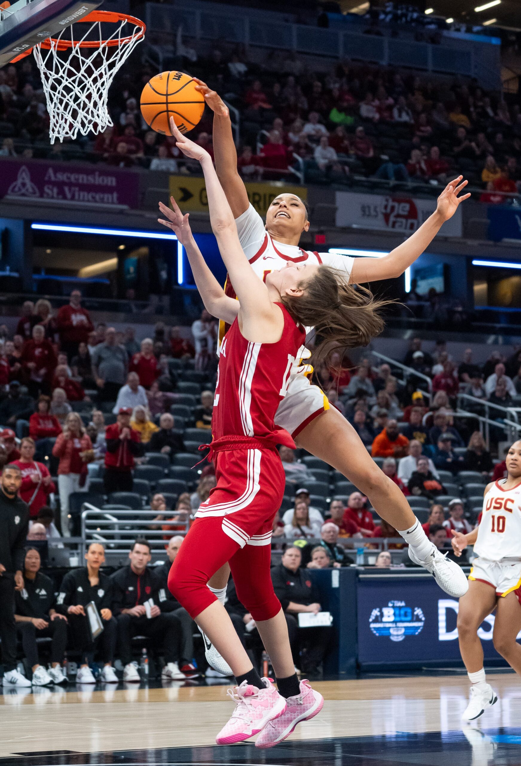 JuJu Watkins blocks the shot of Indiana's Yarden Garzen in a game during the Big Ten tournament.