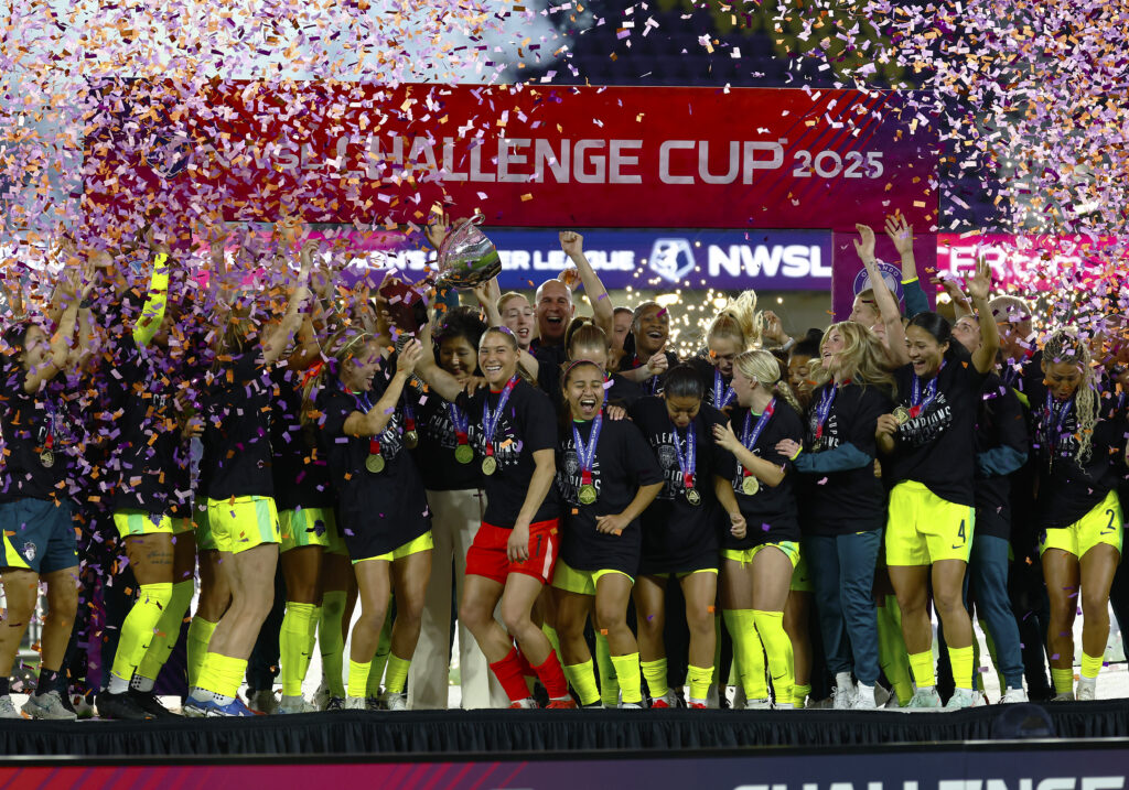 Mar 7, 2025; Orlando, Florida, US;  The Washington Spirit celebrate after winning the Challenger Cup against the Orlando Pride at Inter&amp;Co Stadium. Mandatory Credit: Russell Lansford-Imagn Images