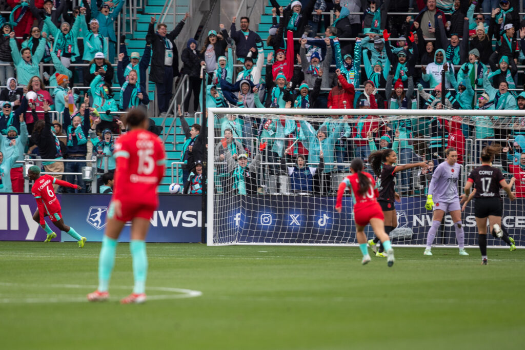Mar 15, 2025; Kansas City, Missouri, USA;  Kansas City Current fans react to a goal scored by Temwa Chawinga in the fourth minute of the game against Portland Thorns FC at CPKC Stadium. Mandatory Credit: Kylie Graham-Imagn Images