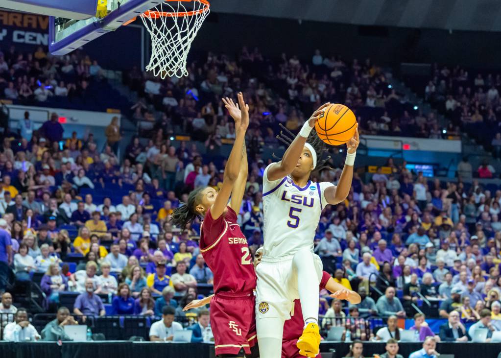 Sa'Myah Smith fights up a layup against Florida State.