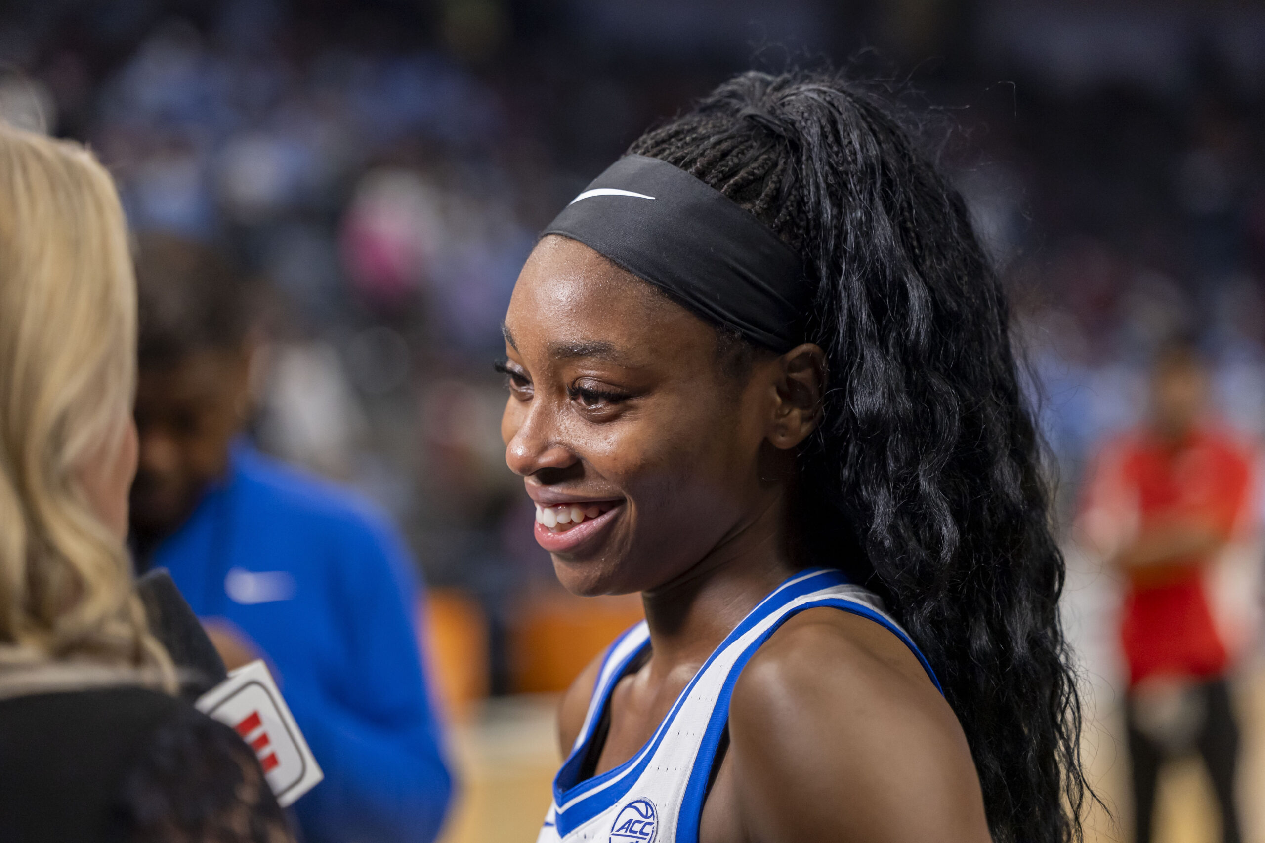 Duke guard Oluchi Okananwa smiles as she is interviewed by ESPN after a win in the NCAA Tournament.