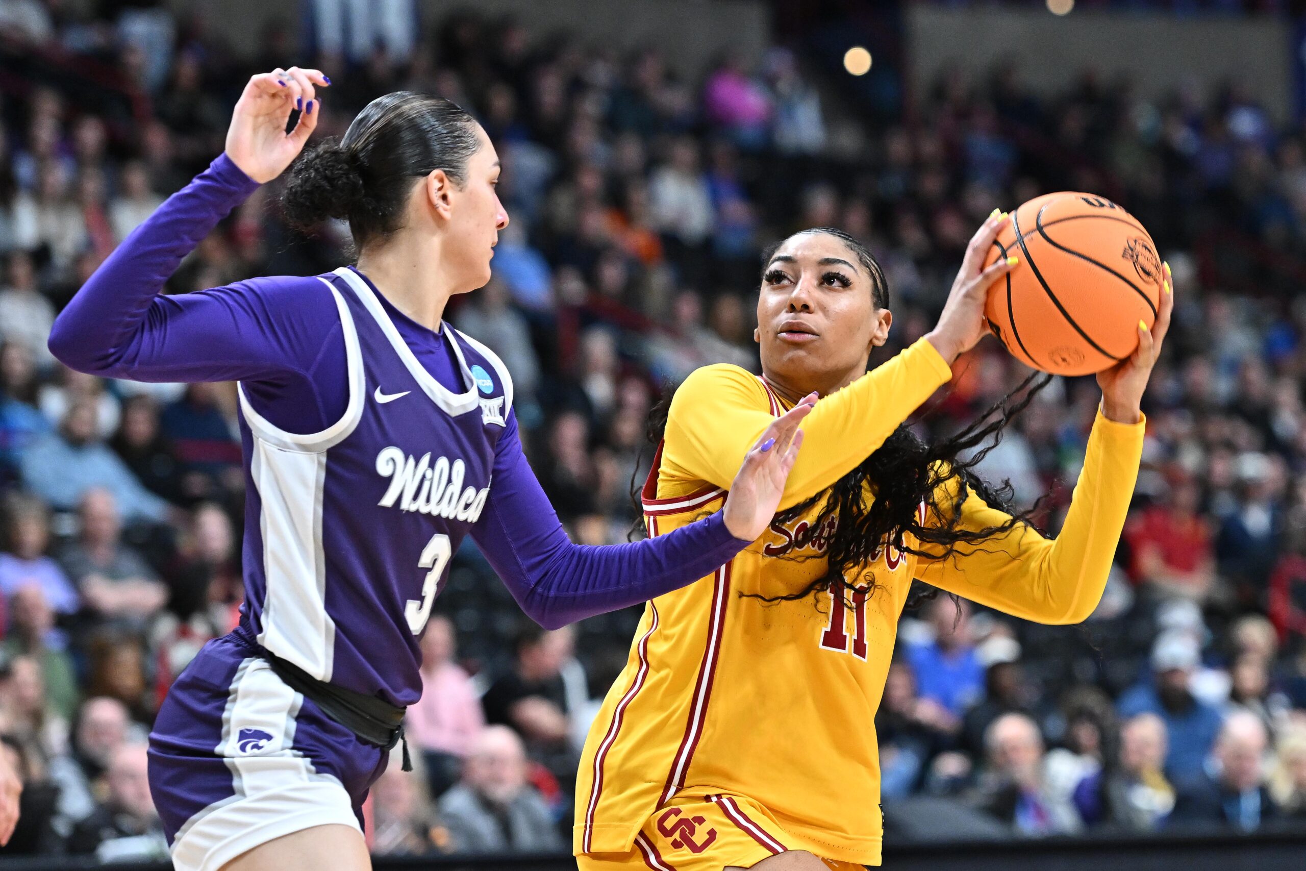 USC Trojans guard Kennedy Smith shoots the basketball over a defender