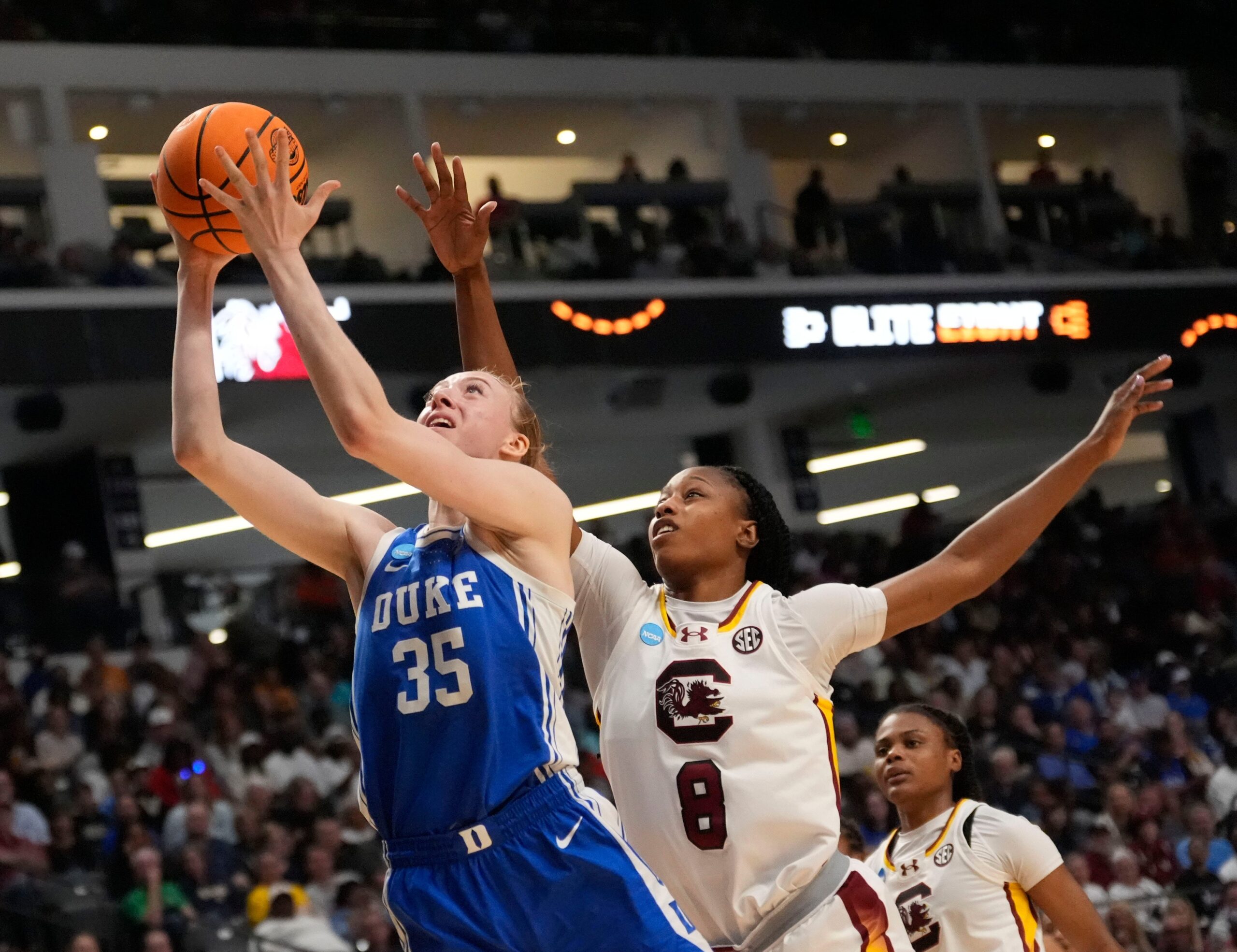 Duke Blue Devils forward Toby Fournier goes up for a layup against South Carolina Gamecocks forward Joyce Edwards.