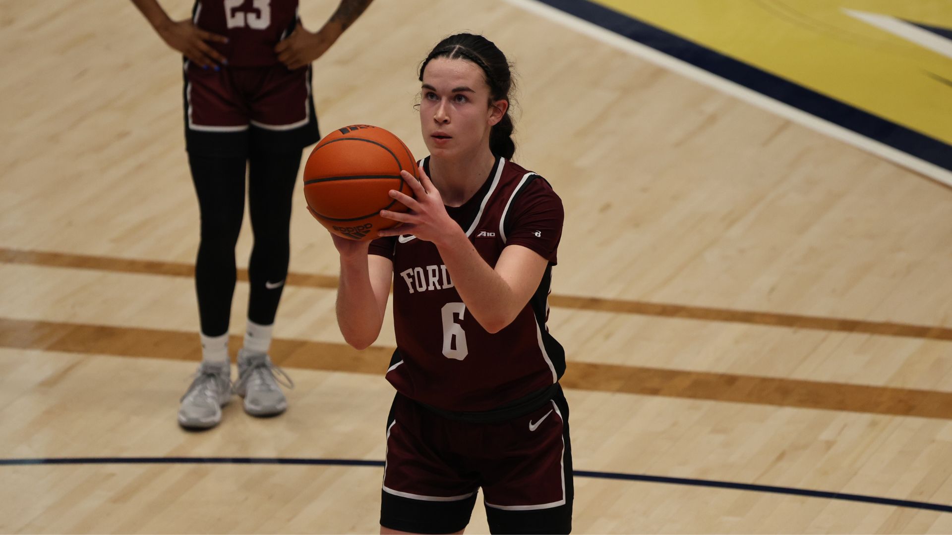 Fordham graduate student forward Irene Murua’s eyes focus on the hoop as she prepares to shoot a free throw.