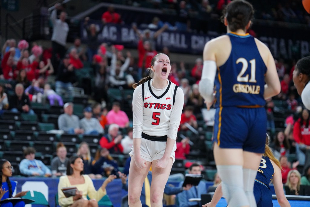 Fairfield sophomore roadrunner Meghan Andersen pumps her fists down and screams after a three-pointer on the right wing. (Photo credit: Olivia Frzop).