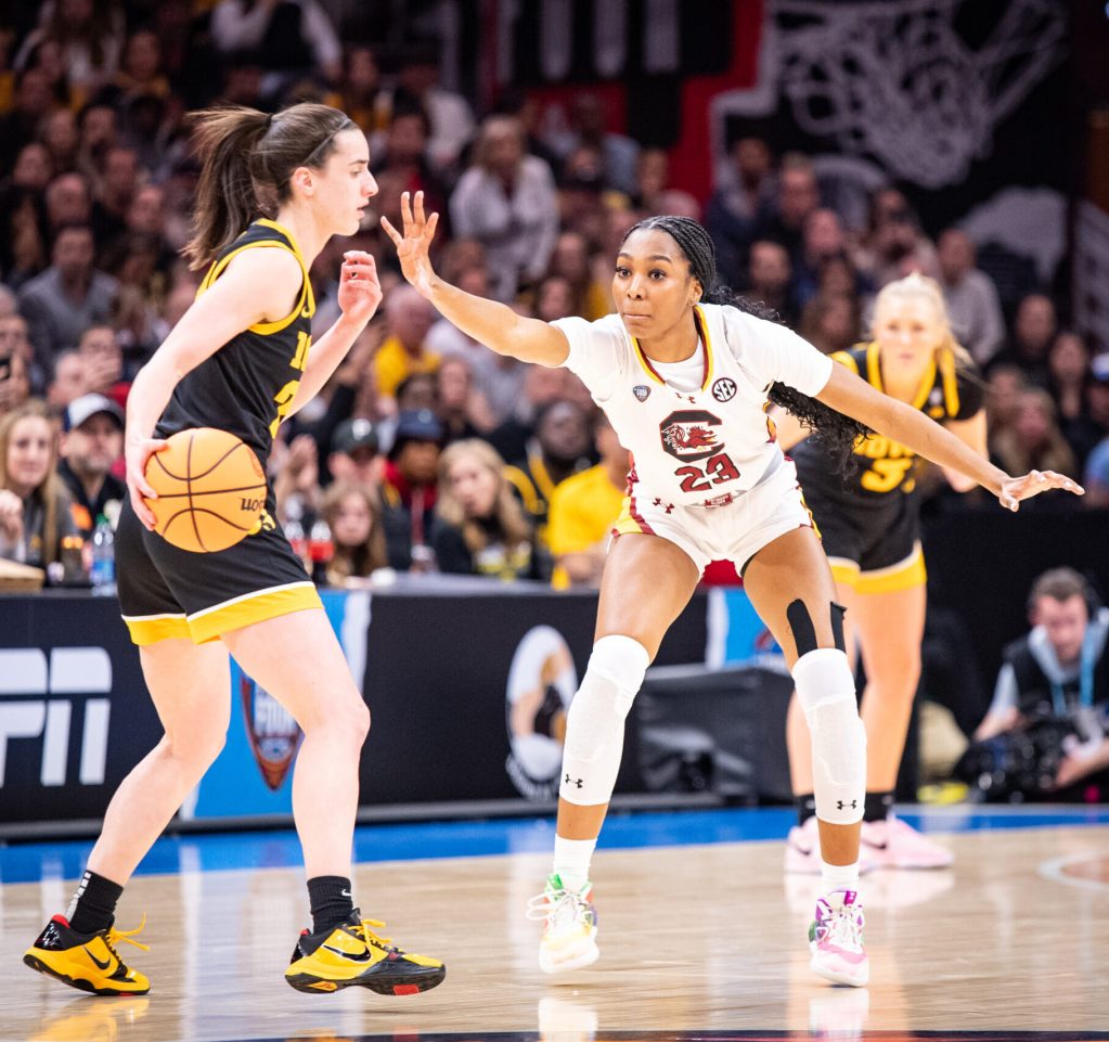 South Carolina guard Bree Hall (23) defends Iowa guard Caitlin Clark (22) in the 2024 NCAA Tournament National Championship game on April 7, 2024 at Rocket Mortgage FieldHouse in Clevenland, Ohio.