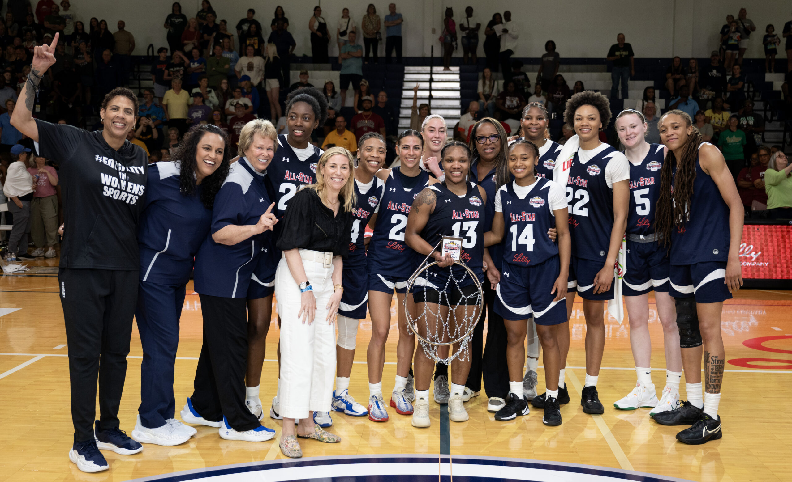 Diamond Johnson holds the MVP hoop following the Lilly's All-Star Game. (Photo credit: Intersport)