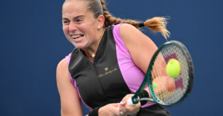 Jelena Ostapenko hits a backhand at the 2024 Rogers Cup.