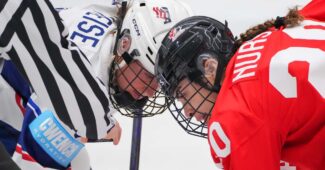 Sarah Nurse and Taylor Heise facing off
