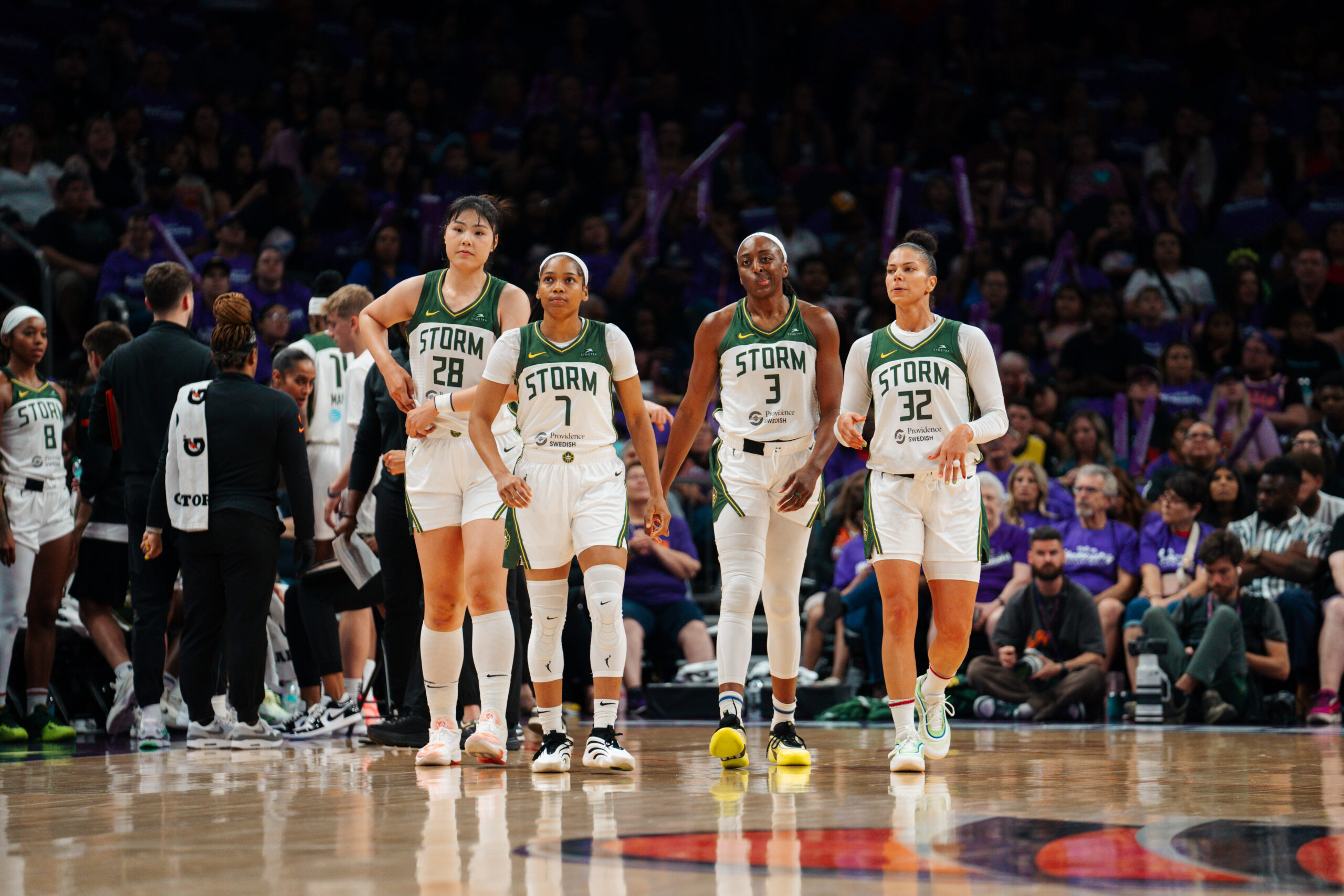 Storm players Li Yueru (28), Zia Cooke (7), Nneka Ogwumike (3) and Alysha Clark (32) walk on the court in a game against the Phoenix Mercury on May 17, 2025 at Footprint Center in Phoenix, Ariz.