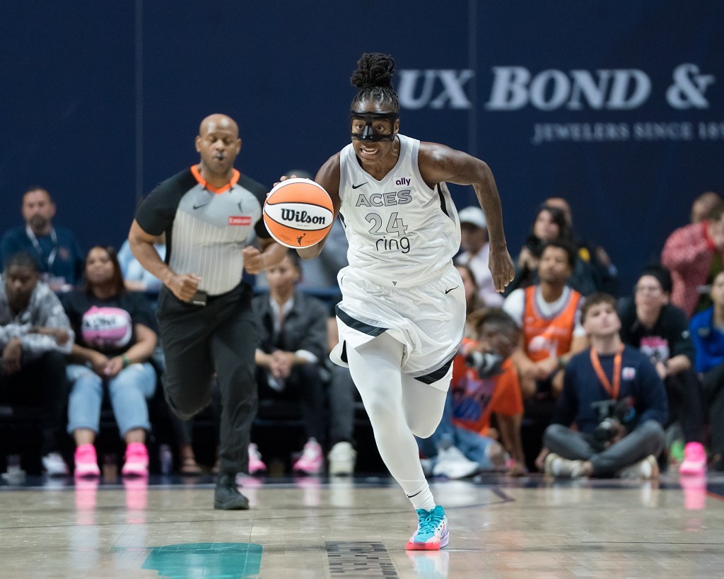 Jewell Loyd dribbles the ball for the Las Vegas Aces.