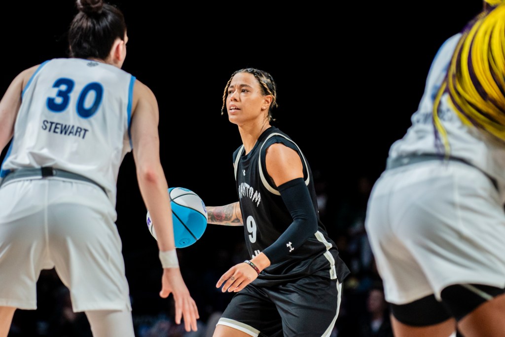 Natasha Cloud handles the ball while being guarded by Breanna Stewart during Unrivaled