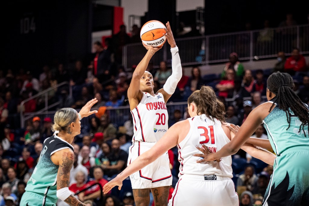 Washington Mystics guard Brittney Sykes shoots an open right-handed jump shot.