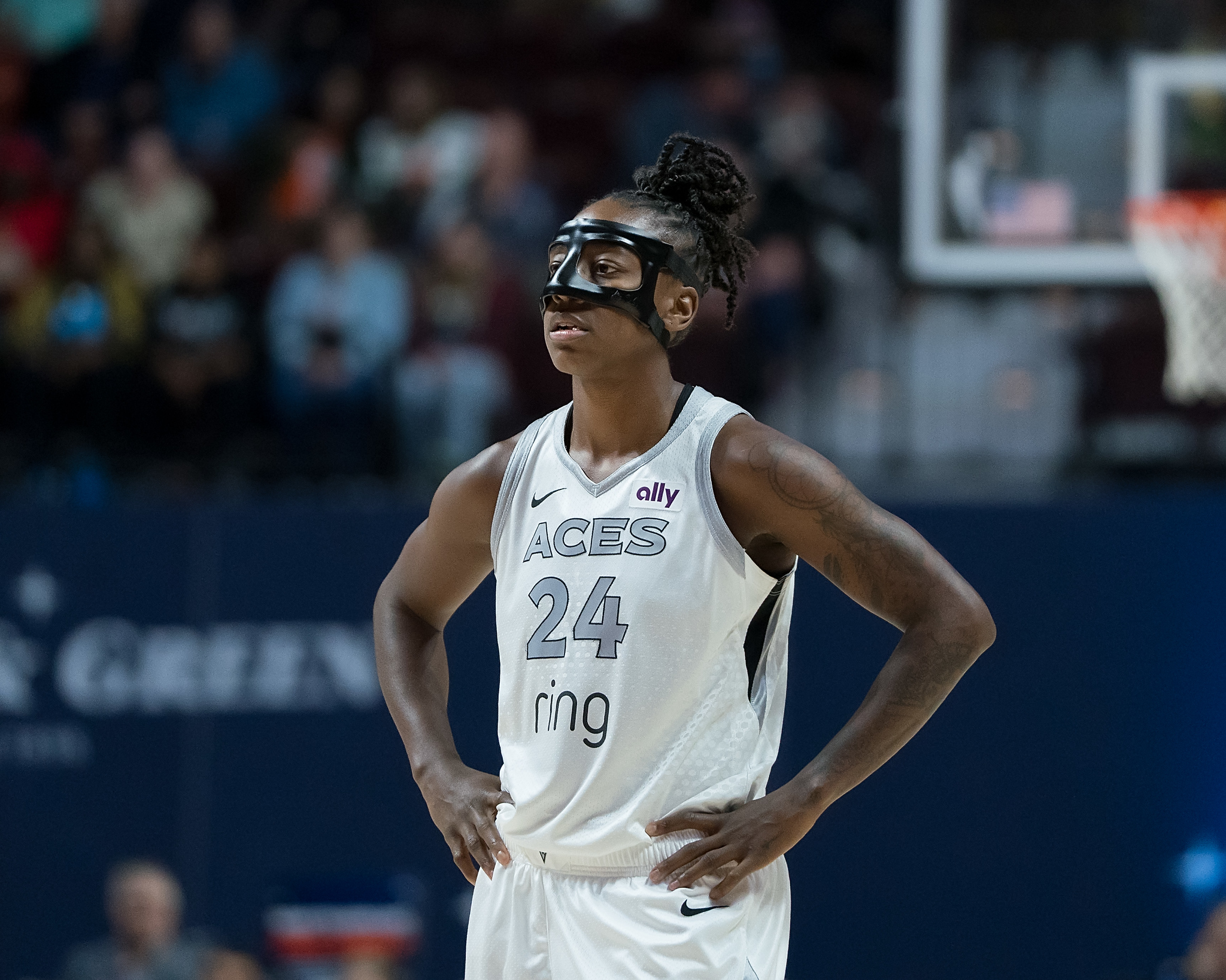 Jewell Loyd dons a black face-mask against the Connecticut Sun.