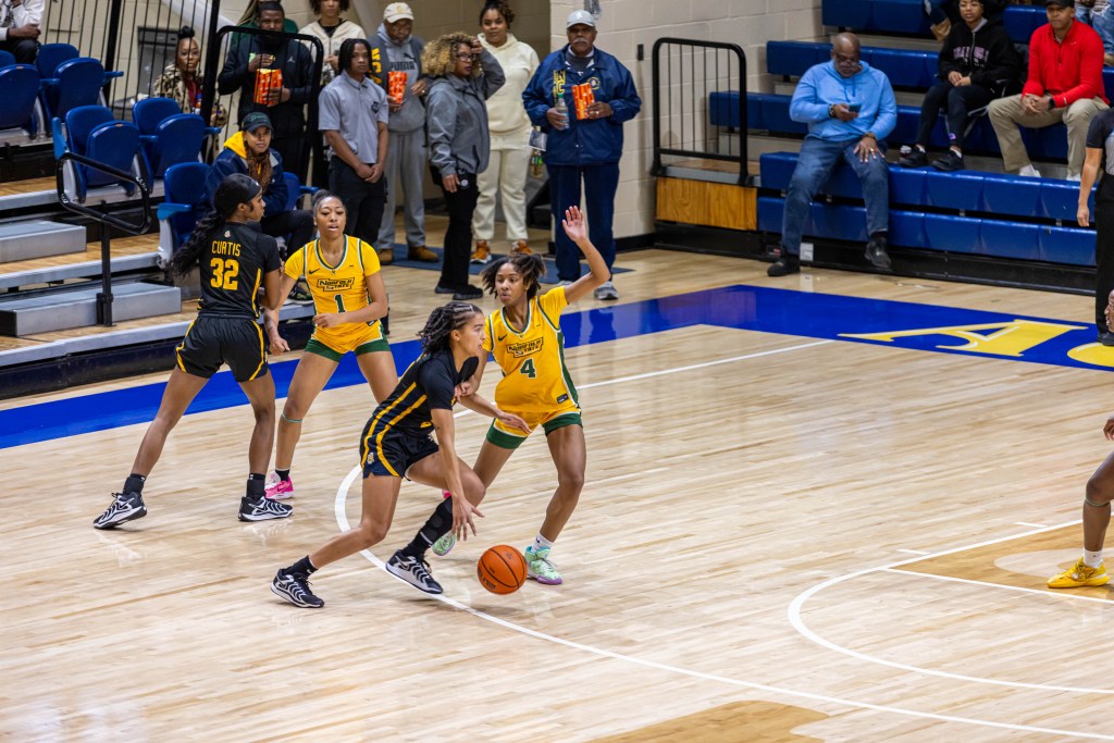 Norfolk State junior guards Da'Brya Clark (#1) and Anjanae Richardson (No. 4) play defense in a game against North Carolina A&T on December 15, 2024. (Photo credit: Norfolk State Athletics)
