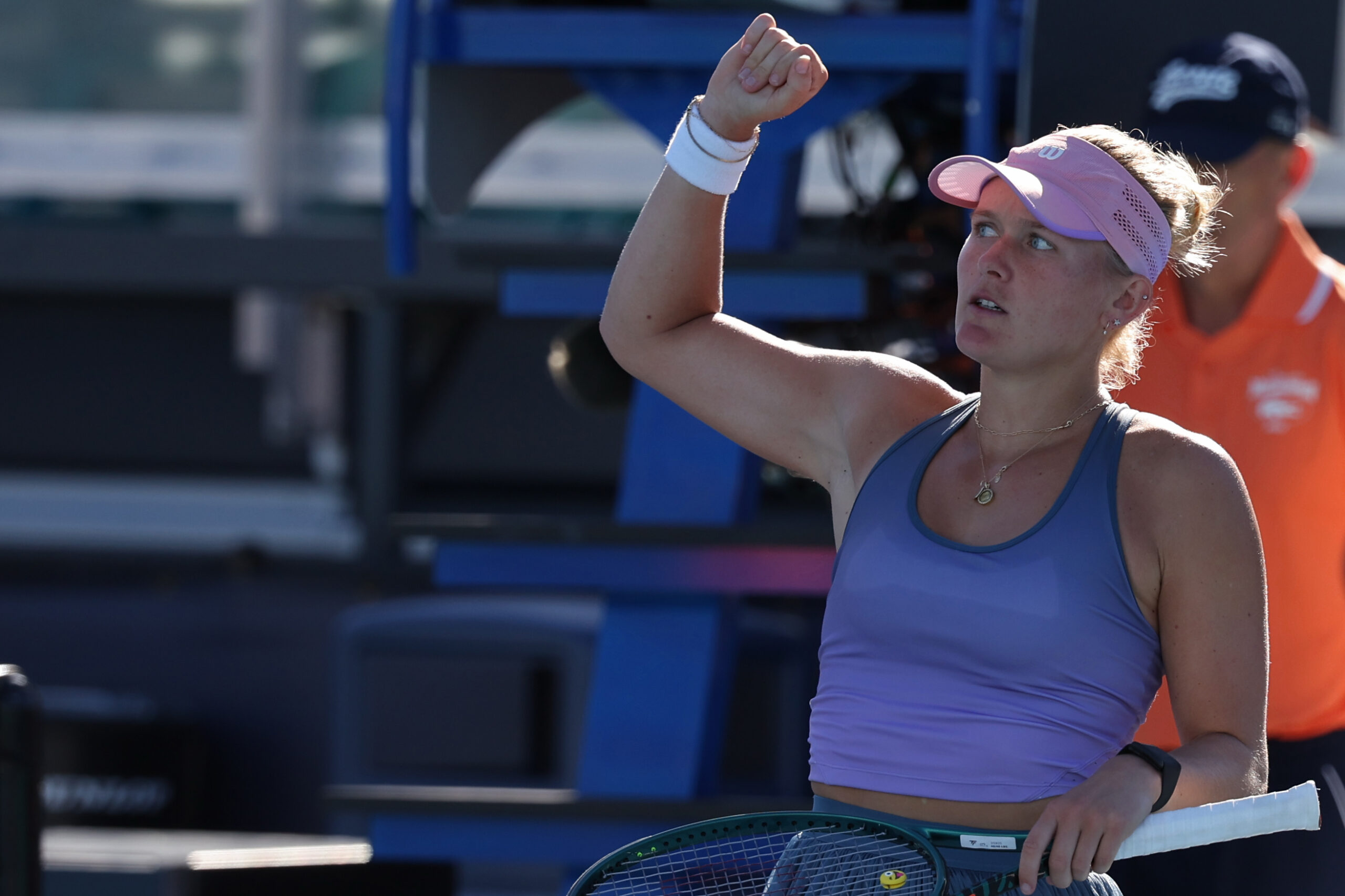 Peyton Stearns acknowledges the crowd with a fist in the air.