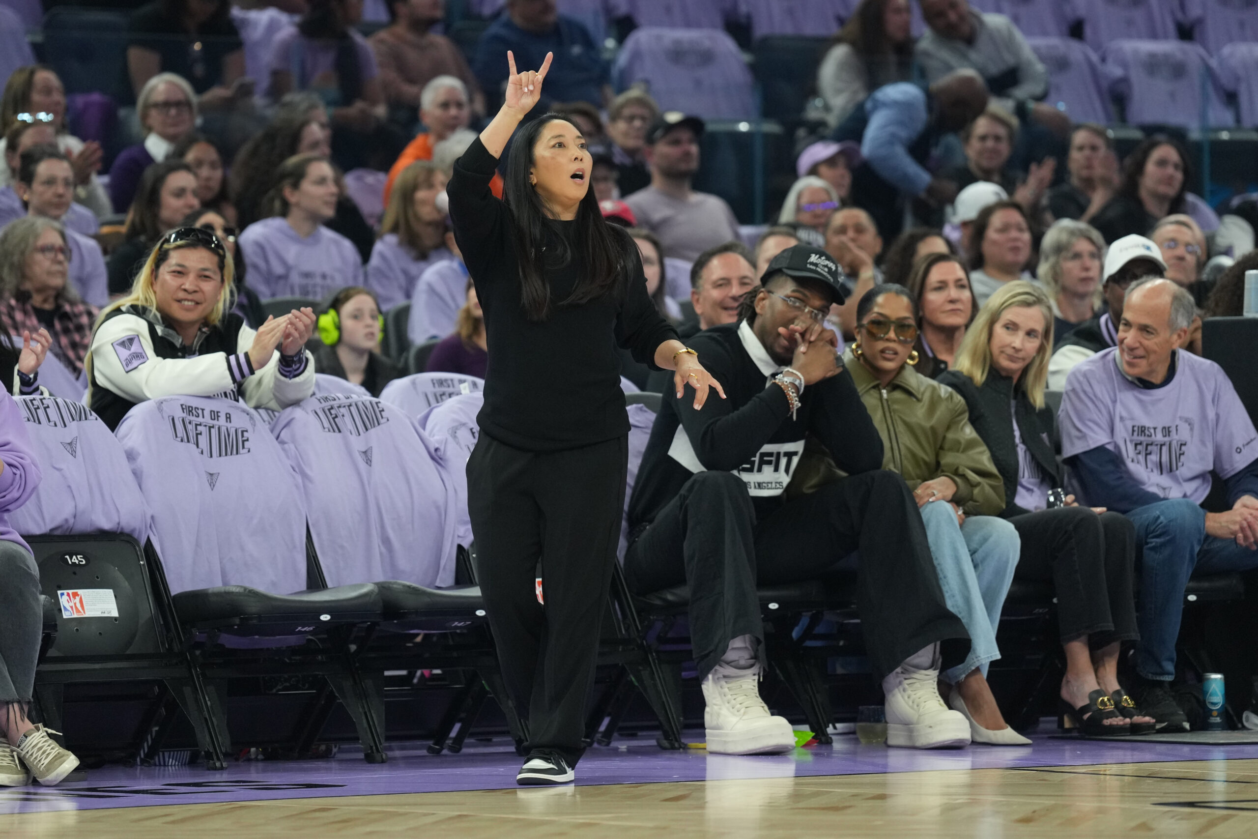 Valkyries head coach Natalie Nakase coaches her team in their WNBA debut game at Chase Center.