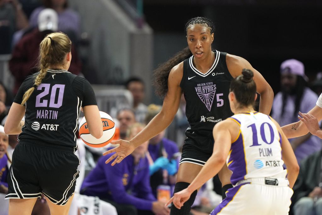 Valkyries forward Kayla Thornton passes to guard Kate Martin against Los Angeles Sparks