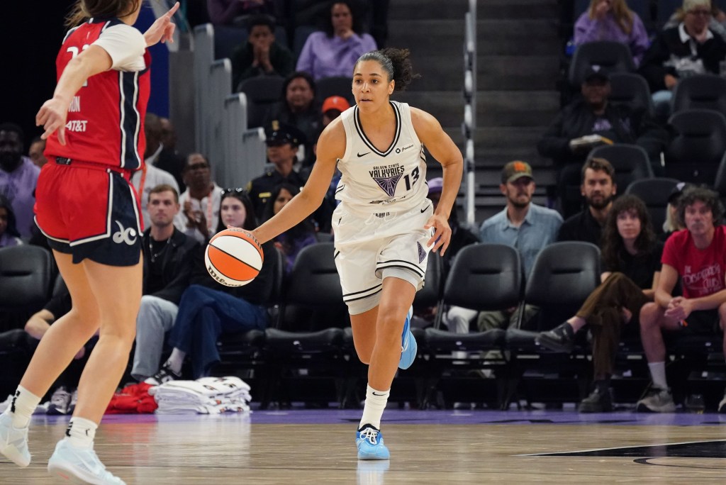 Valkyries forward Janelle Salaun dribbles up court 