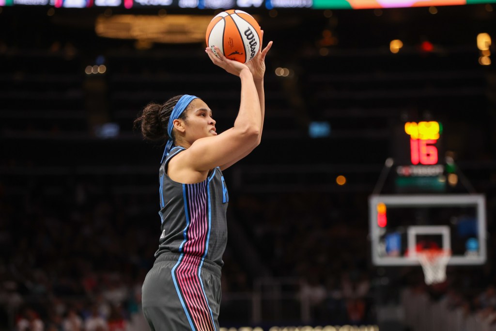 Brionna Jones shoots a jump shot