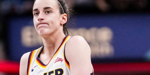 Caitlin Clark shrugs.