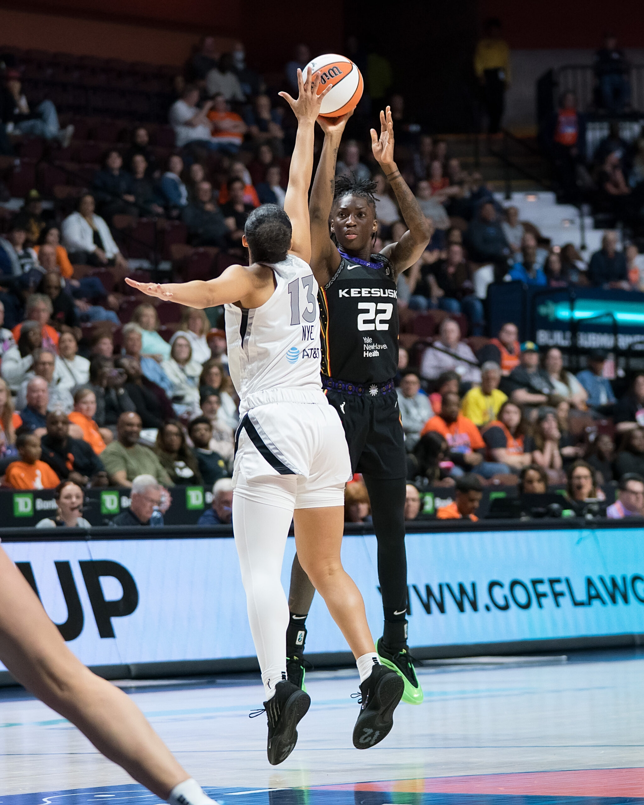 Two players jump for the ball