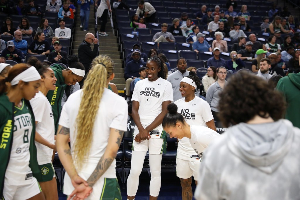 The Seattle Storm huddle up ahead of their game against the Minnesota Lynx on May 27, 2025 at Target Center in Minneapolis, Minnesota.
