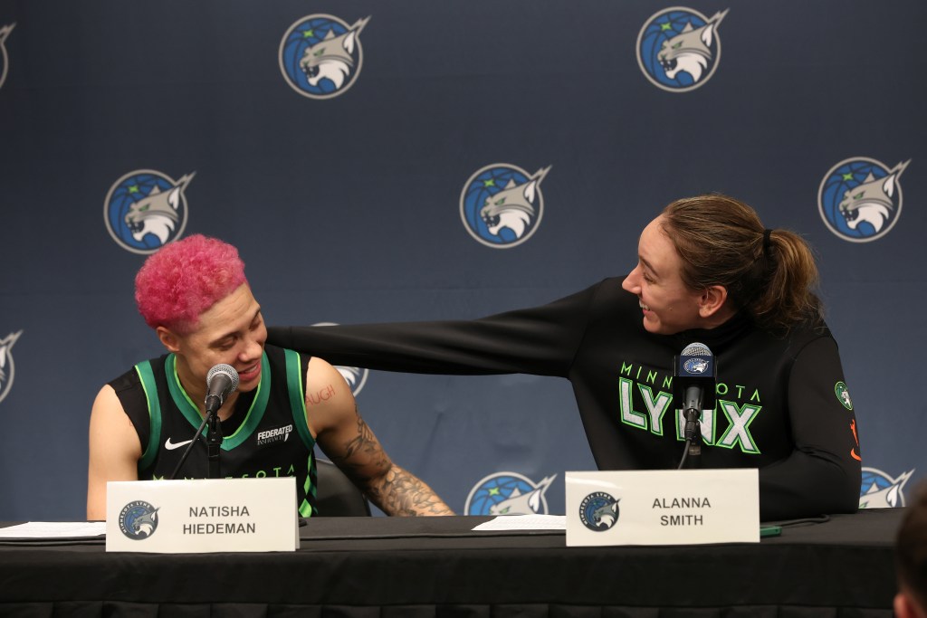 Alanna Smith puts her hand on teammate Natisha Hiedeman's shoulder