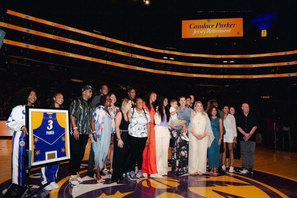 Candace Parker with her family and support group during halftime of her jersey retirement on Sunday, June 29.