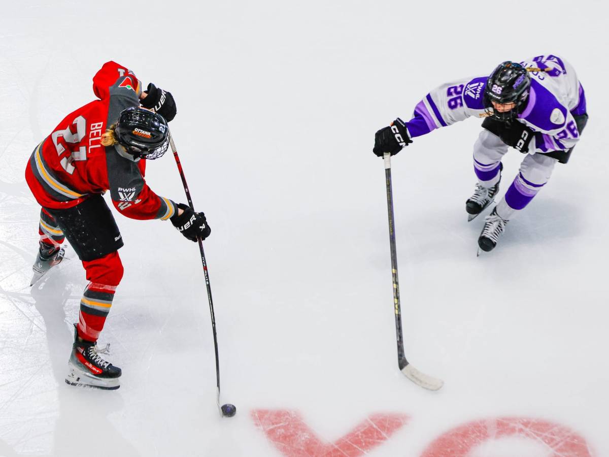 Ashton Bell looks to shoot the puck