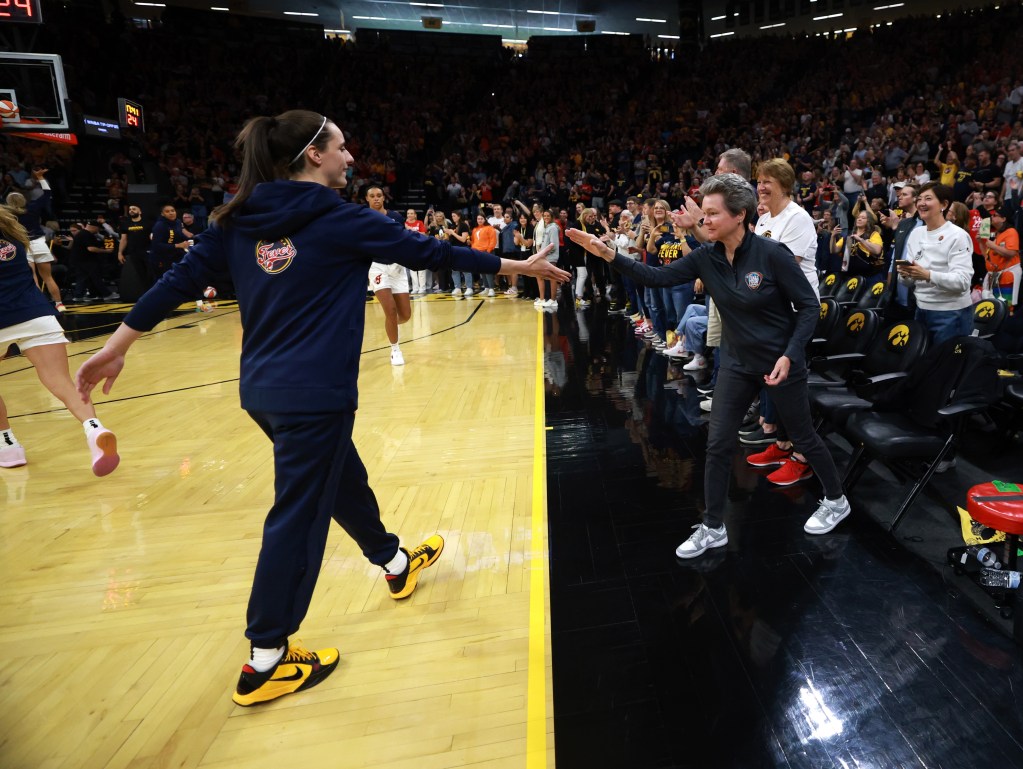 Caitlin Clark and Sue Beckwith at Indiana Fever game at Carver-Hawkeye Arena