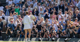 Barbora Krejcikova holds the 2024 Wimbledon trophy