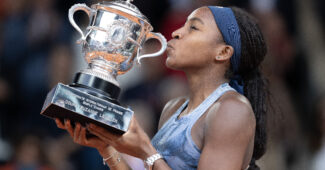 Coco Gauff kisses the Roland Garros champion's trophy