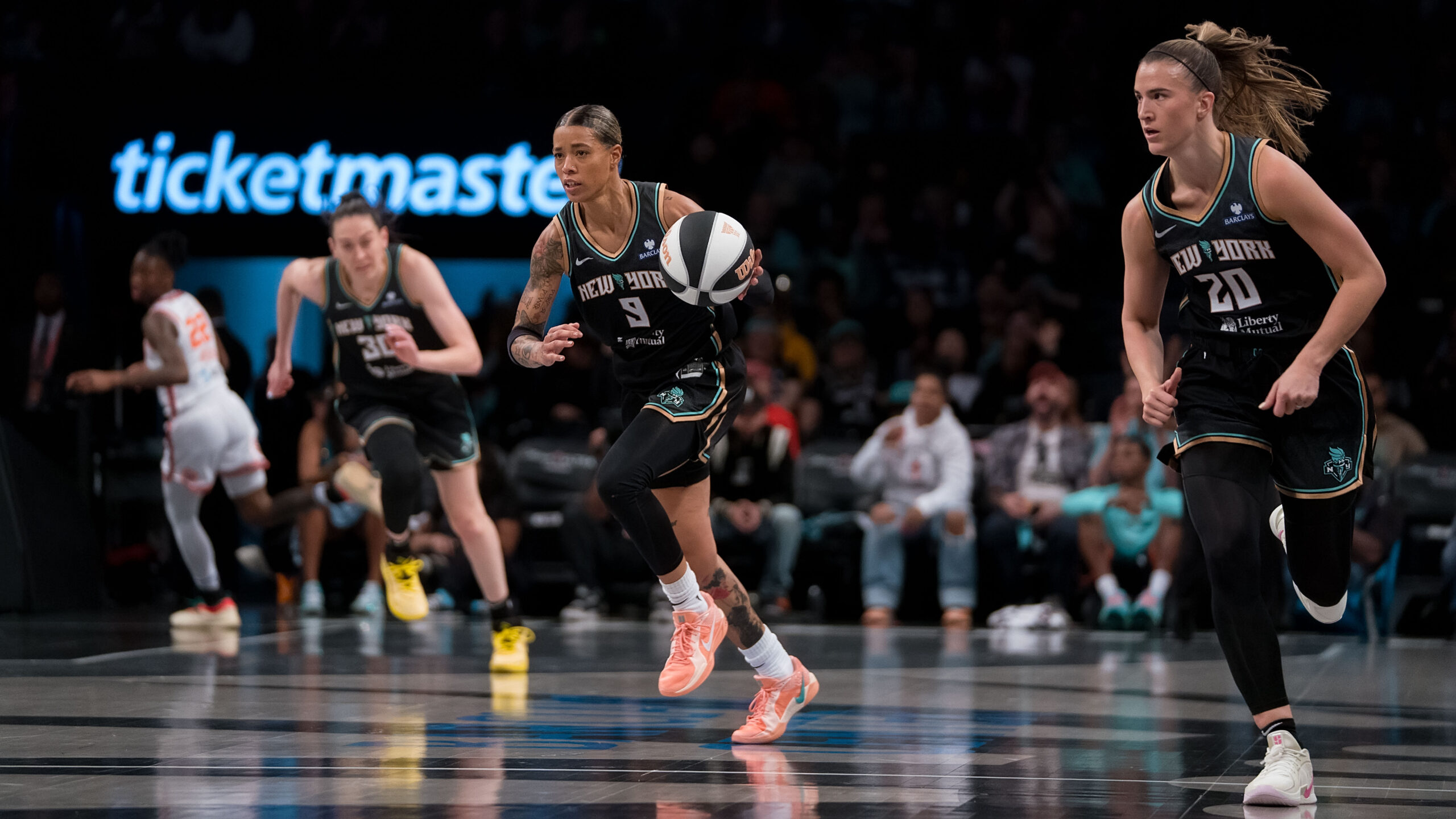 New York Liberty guard Natasha Cloud (9) brings the ball up the court during the WNBA game between the Connecticut Sun and the New York Liberty at Barclays Center, Brooklyn, New York.