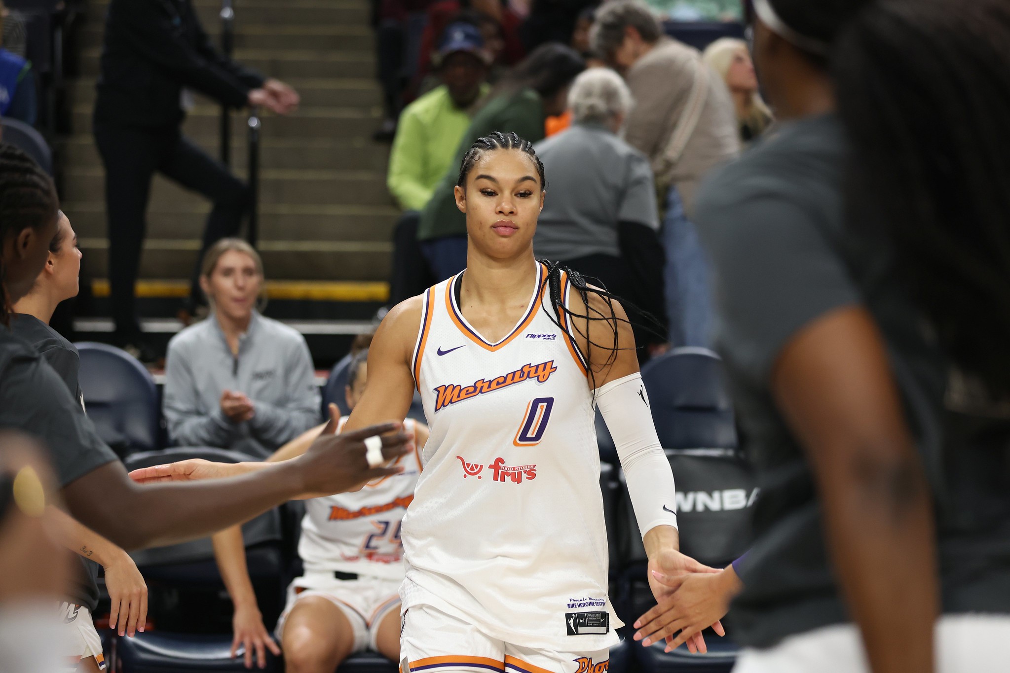 Phoenix Mercury forward Satou Sabally high-fives teammates during pregame introductions