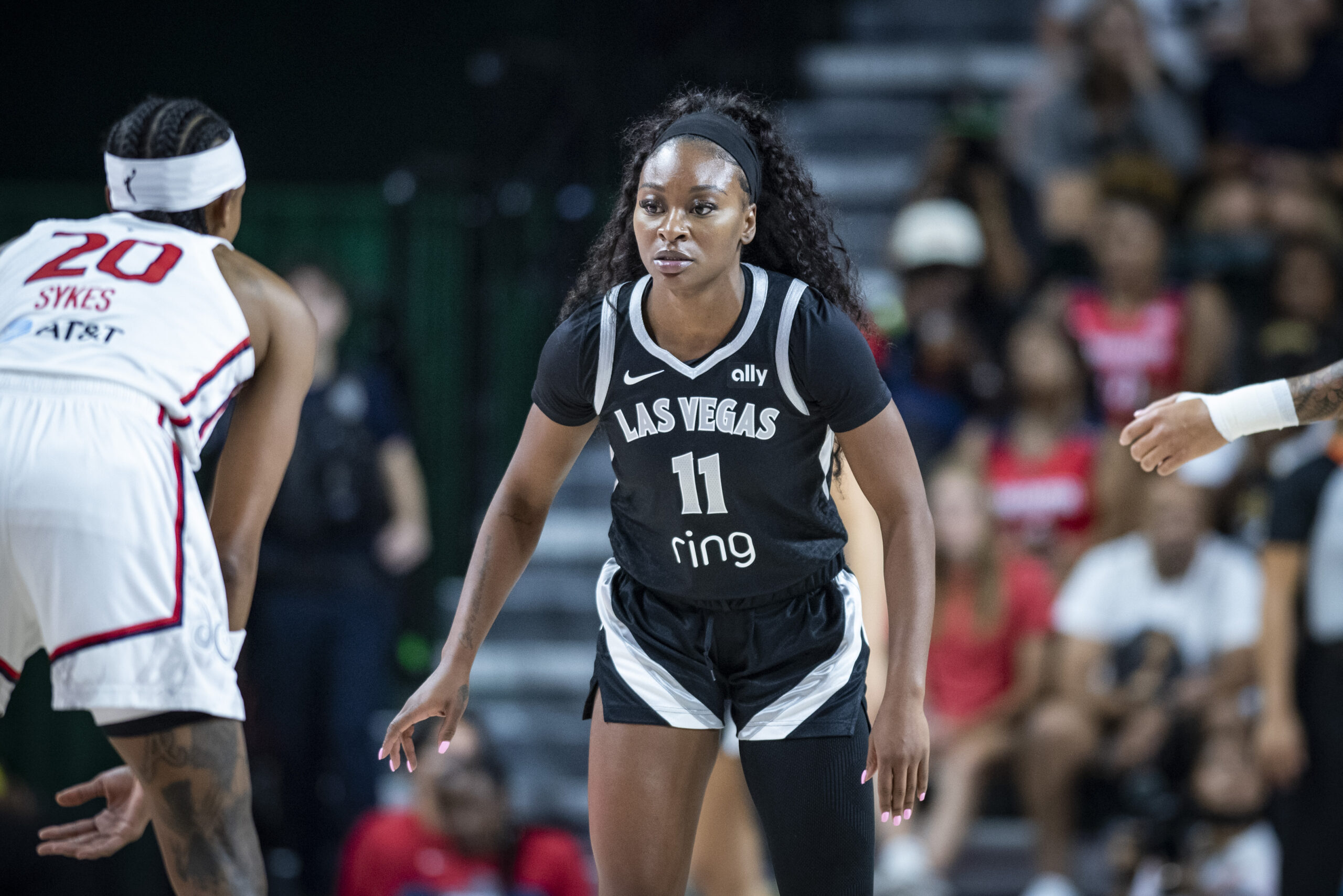 Aces guard Dana Evans matches up defensively against Mystics guard Brittney Sykes.
