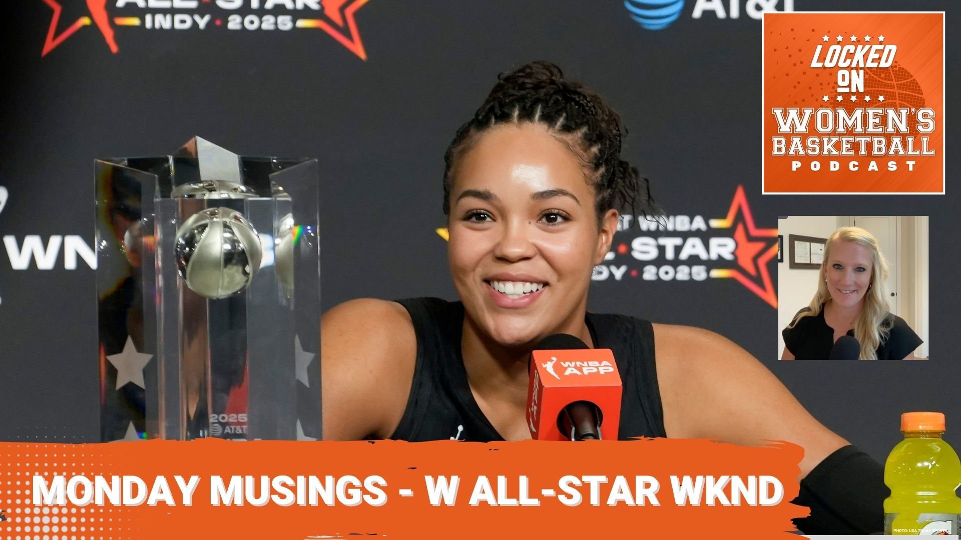 Napheesa Collier smiles in front of the microphone at a press conference during all star weekend