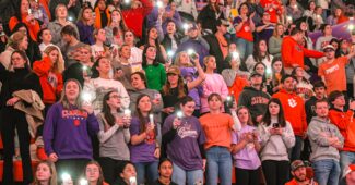 Clemson student section waves their cell phone lights