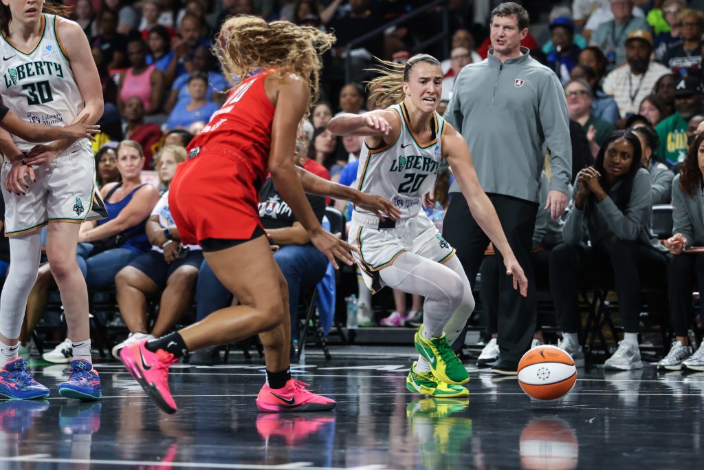 New York Liberty guard Sabrina Ionescu drives the ball towards the goal against Atlanta Dream forward <a rel=