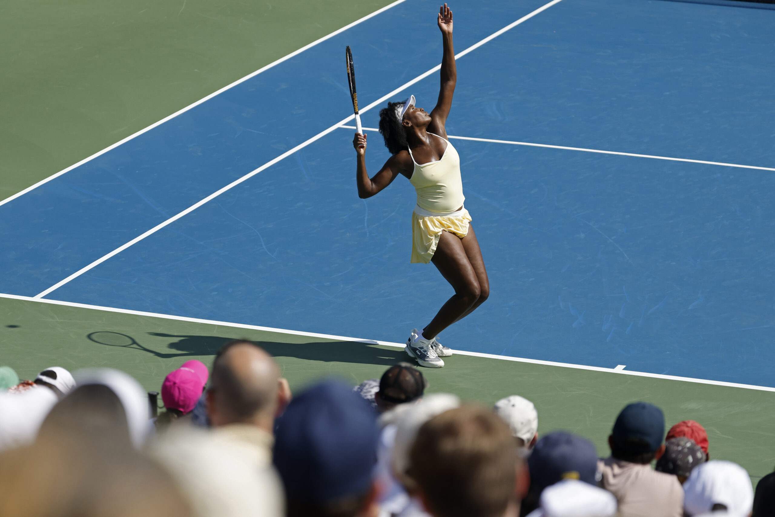 Venus Williams serves in her first round doubles match at the Mubadala Citi DC Open.