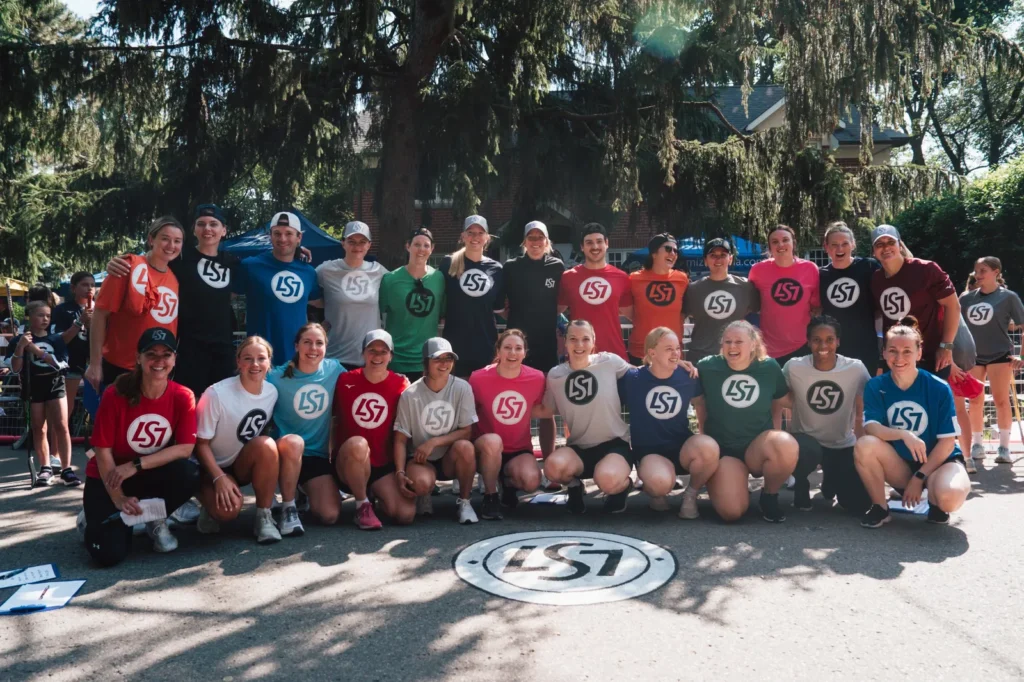 PWHL players and participants in Laura Stacey's LS7 Sticks In For Charity event pose for a picture. (Photo via @laurastacey7 on Instagram)