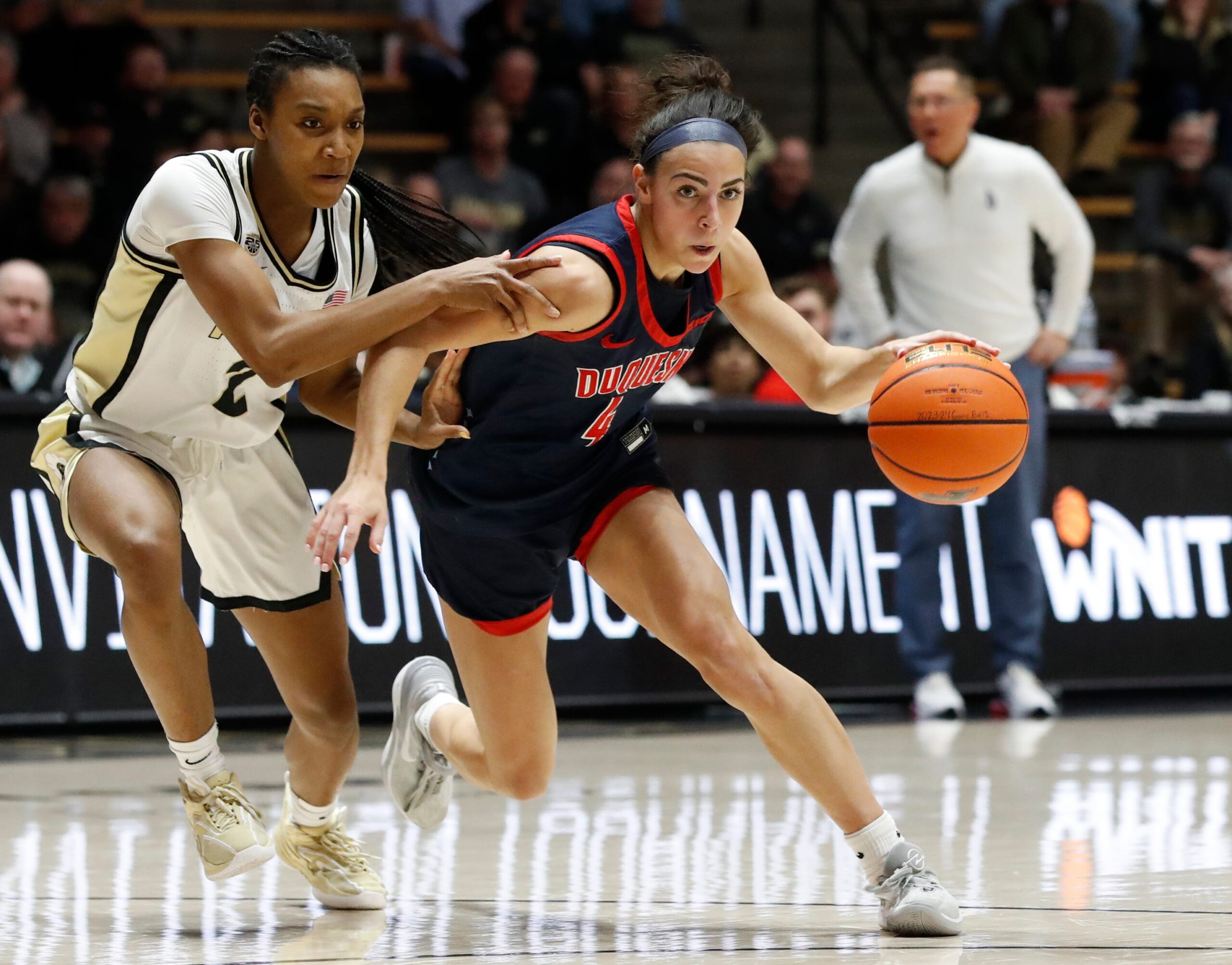 Duquesne guard Megan McConnell drives to the basket