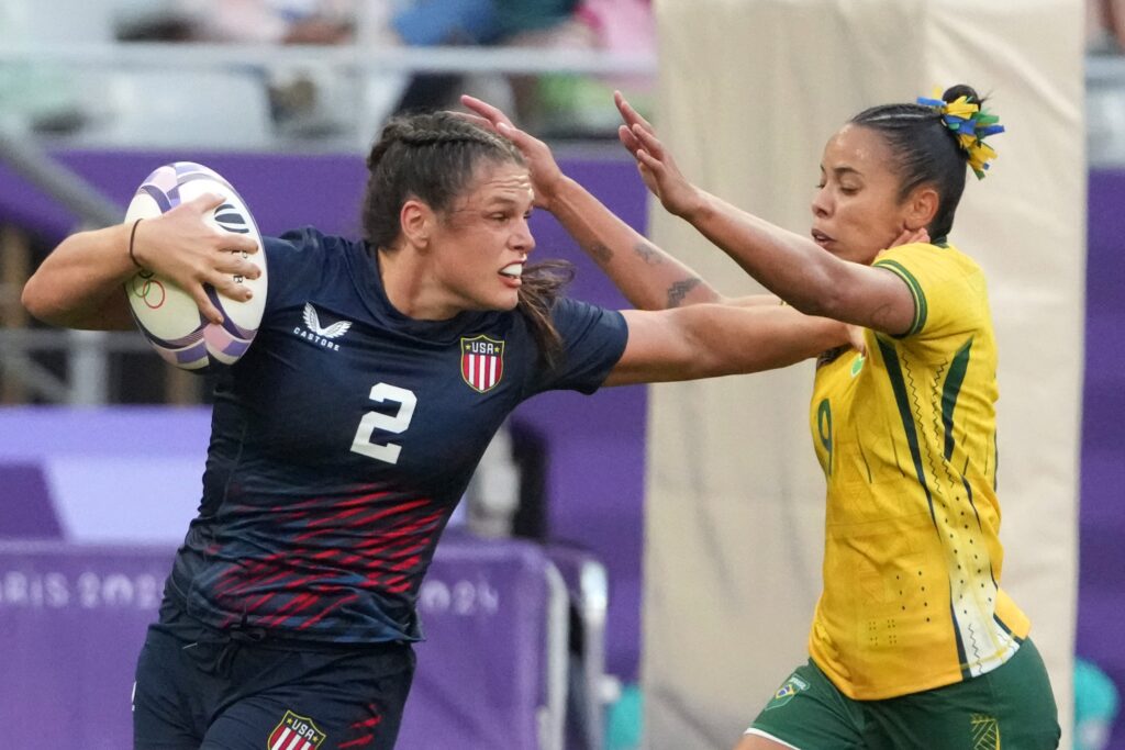United States forward Ilona Maher carries the ball against Brazil back Gabriela Lima.