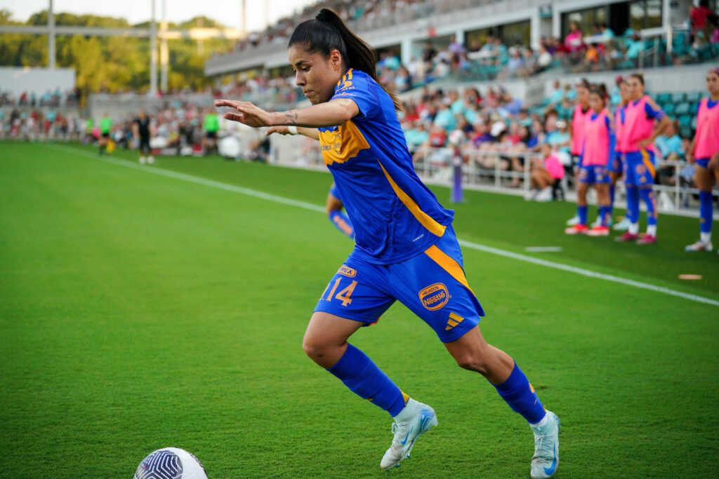 Aug 1, 2024; Kansas City, MO, USA; Tigres UANL midfrielder Lizbeth Ovalle (14) controls the ball against the Kansas City Current during the match at CPKC Stadium. Mandatory Credit: Denny Medley-USA TODAY Sports