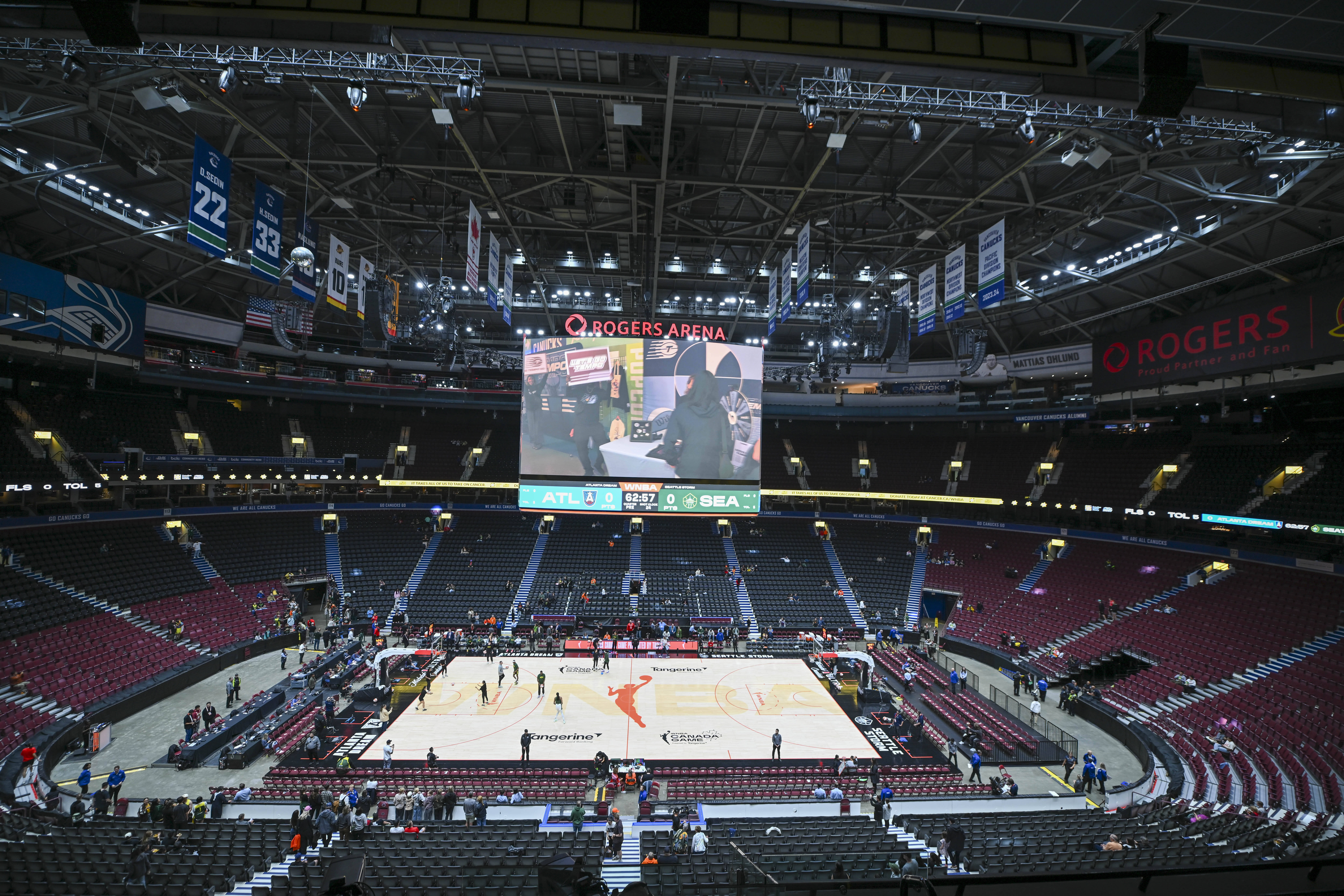 A wide-angle view of the court and the stands at Rogers Arena before a WNBA game.