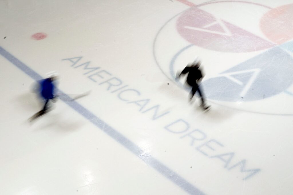 Aerial view of the at the American Dream Meadowlands ice rink with two blurred skaters