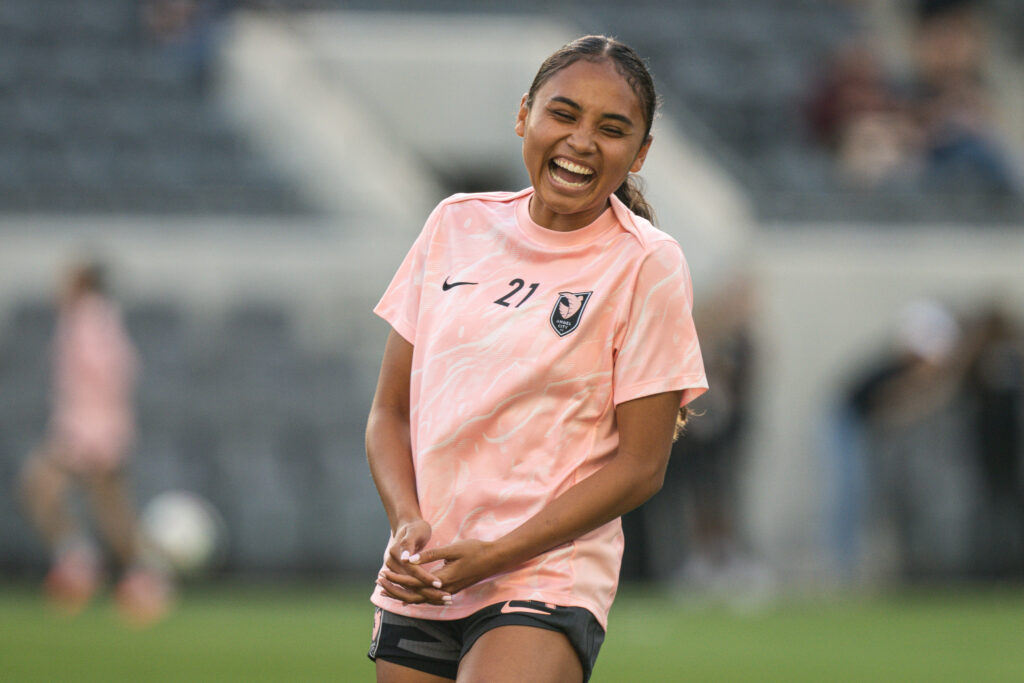 Jun 14, 2025; Los Angeles, California, USA; Angel City FC forward Alyssa Thompson (21) during pregame warm ups against the NC Courage at BMO Stadium. Mandatory Credit: Jon Endow-Imagn Images
