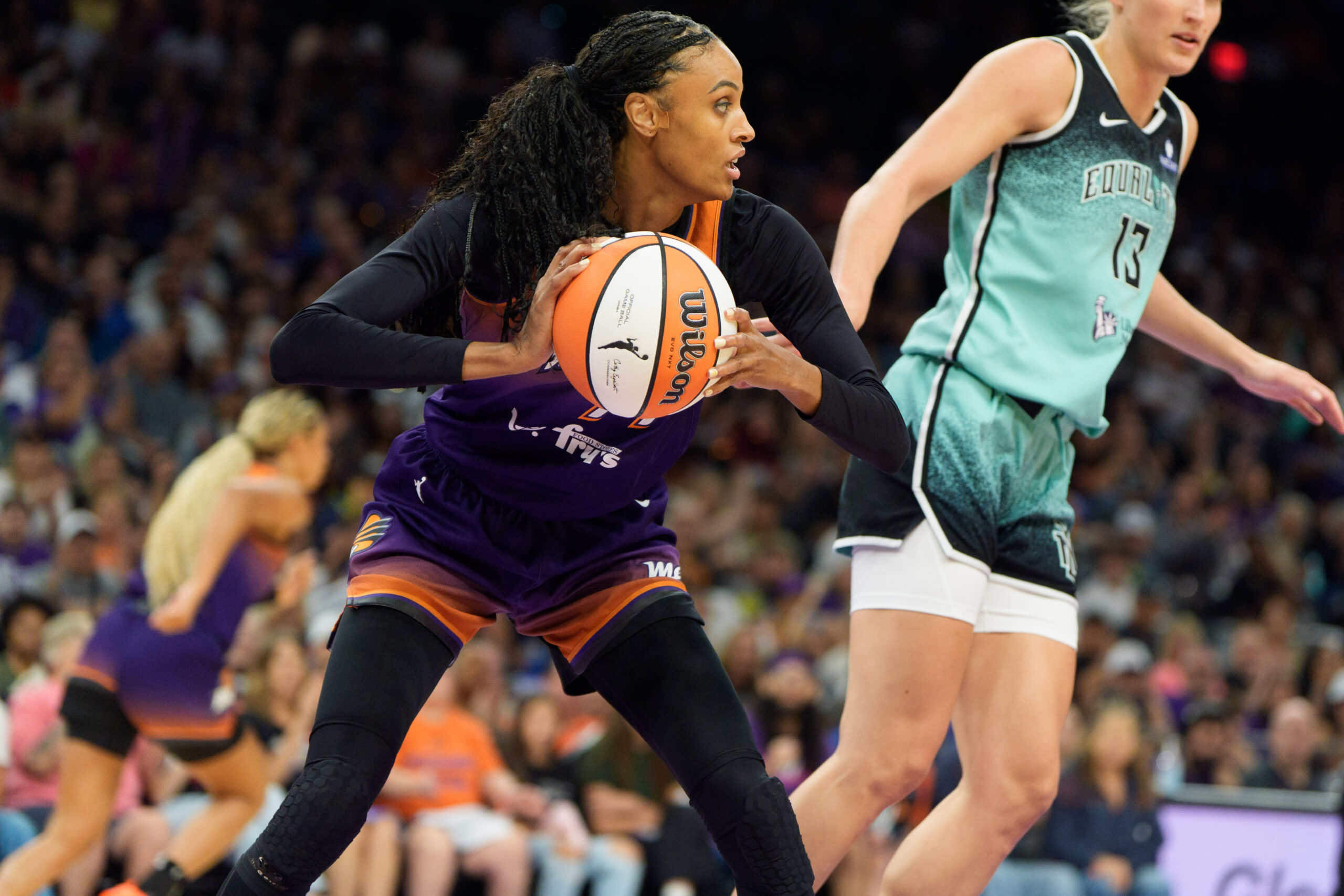 Phoenix Mercury forward DeWanna Bonner secures a rebound and looks for an outlet pass in Game 1 versus the New York Liberty.