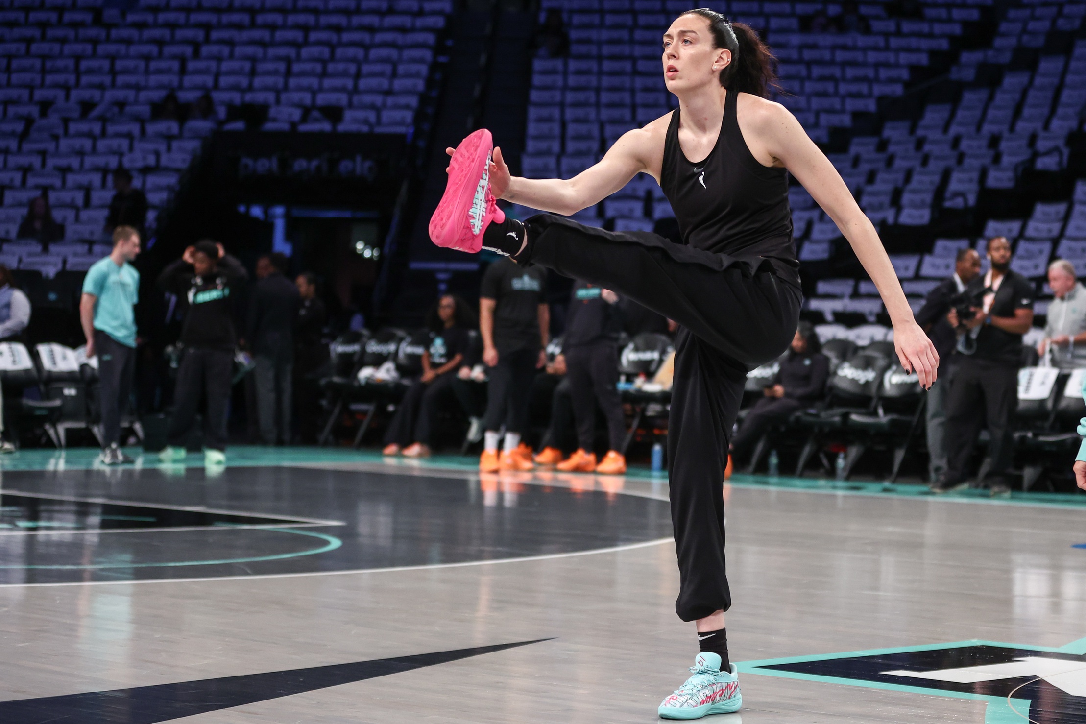 Breanna Stewart stretches.